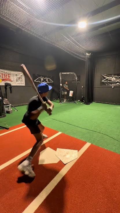 Young hitter poor setup in cage