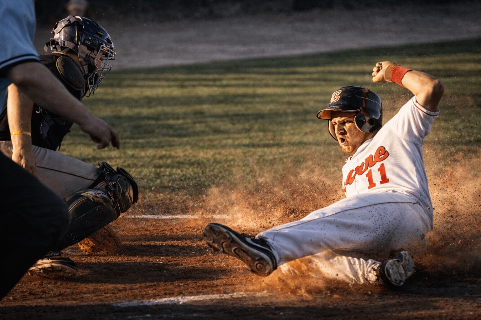 Sliding into home during a Cape Cod Baseball League game
